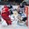 OSTRAVA, CZECH REPUBLIC - MAY 11: Finland's Pekka Rinne #35 tracks a loose puck with Sami Lepisto #18, Petri Kontiola #27 and Belarus' Sergei Drozd #13 battling in front during preliminary round action at the 2015 IIHF Ice Hockey World Championship. (Photo by Andrea Cardin/HHOF-IIHF Images)

